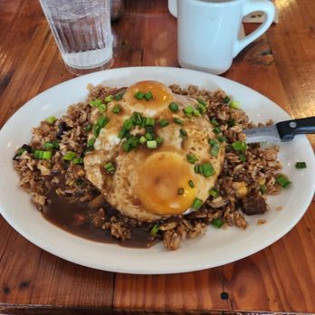 Moke’s Bread And Breakfast - Loco Moco - Ribeye and Chorizo beef patty over Portuguese sausage fried rice. Topped with 2eggs smothered in gravy. - Breakfast & Brunch Near Me - Honolulu, Hawaii Moke’s Bread And Breakfast - Loco Moco - Ribeye and Chorizo beef patty over Portuguese sausage fried rice. Topped with 2eggs smothered in gravy. - Breakfast & Brunch Near Me - Honolulu, Hawaii