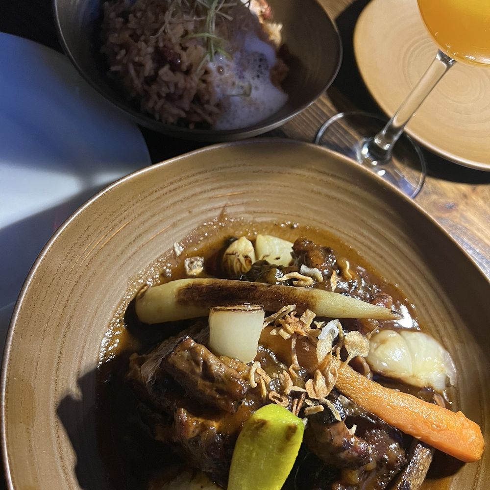 Mango Bay - Braised Oxtail with rice and peas - Caribbean Near Me - Brooklyn, New York Mango Bay - Braised Oxtail with rice and peas - Caribbean Near Me - Brooklyn, New York