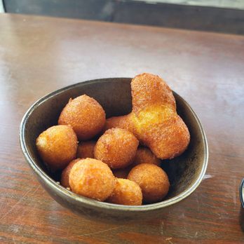 Capt Juel's Hurricane Restaurant - Fritters/hushpuppies with honey butter! - Seafood Near Me - Little River, South Carolina Capt Juel's Hurricane Restaurant - Fritters/hushpuppies with honey butter! - Seafood Near Me - Little River, South Carolina