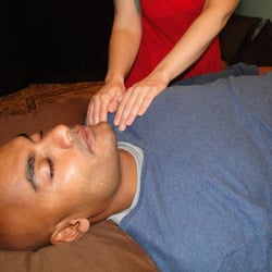 Learn Reiki Philadelphia - Danielle gives a session to a client