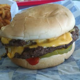 Double cheeseburger with ketchup, mustard, pickle & onion.