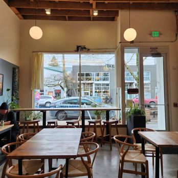 Pasture PDX - a view of a dining room with tables and chairs - Wine Bars Near Me - Portland, Oregon Pasture PDX - a view of a dining room with tables and chairs - Wine Bars Near Me - Portland, Oregon