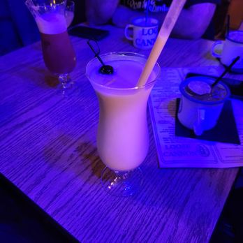 Loose Cannon - A very rum forward but still delicious frozen pina colada! - Dive Bars Near Me - Houston, Texas