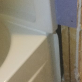 Goss Handyman and Construction - Tub never leveled or mounted..nice gap. Notice caulking? - General Contractors Near Me Goss Handyman and Construction - Tub never leveled or mounted..nice gap. Notice caulking? - General Contractors Near Me