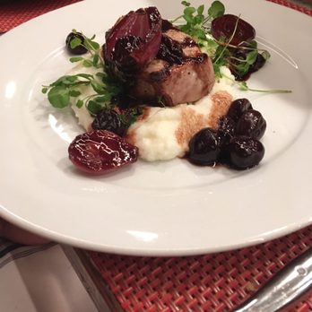 Frenchish - Pork on bed of mashed potatoes. - French Near Me - Albuquerque, New Mexico