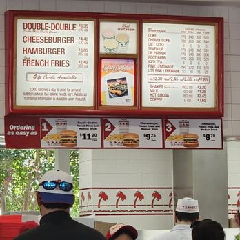 In-N-Out Burger - Menu board... it's fairly simple. These poor folks working hard yet unable to keep up the volume - Burgers Near Me - Vacaville, California In-N-Out Burger - Menu board... it's fairly simple. These poor folks working hard yet unable to keep up the volume - Burgers Near Me - Vacaville, California