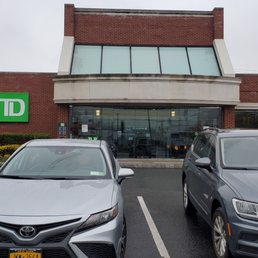 Exterior outside entrance of TD Bank - Mineola, New York Exterior outside entrance of TD Bank - Mineola, New York