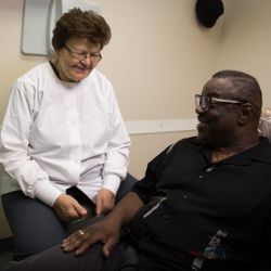 Ardelean Family Dentistry - Dr. Florica Ardelean, DDS helping a patient