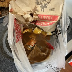 KFC - The other half of the gravy is all over my coat and seat of my vehicle