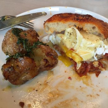 Figo - Eggs Benedict (half eaten) - Italian Near Me - Toronto, Ontario