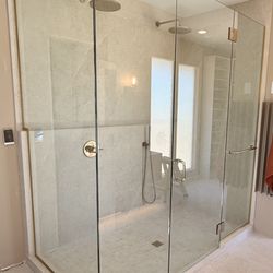 Mobile Screen & Glass - Large custom frameless shower enclosure installed by Mobile Screen & Glass