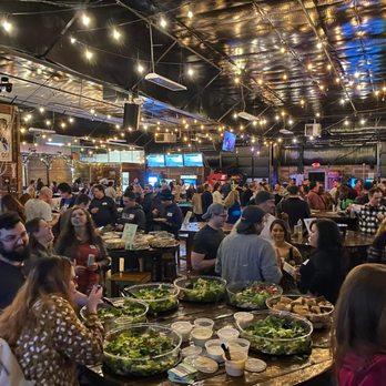 Tilted Axes - a large group of people in a restaurant - Axe Throwing Near Me - West Chester, Pennsylvania Tilted Axes - a large group of people in a restaurant - Axe Throwing Near Me - West Chester, Pennsylvania