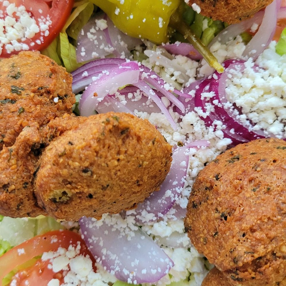 Athena's Gyros - Falafel Salad, full size. The Falafels were delicious & the salad was fresh. - Mediterranean Near Me - Loganville, Georgia Athena's Gyros - Falafel Salad, full size. The Falafels were delicious & the salad was fresh. - Mediterranean Near Me - Loganville, Georgia