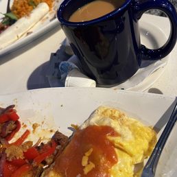 Breakfast of champions... brisket omelette, Mexican potatoes, and coffee Breakfast of champions... brisket omelette, Mexican potatoes, and coffee