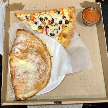 New York Pizza Company - Meat Lover's Calzone and Buffalo Chicken Slice with Extra Toppings - Pizza Near Me - Orlando, Florida New York Pizza Company - Meat Lover's Calzone and Buffalo Chicken Slice with Extra Toppings - Pizza Near Me - Orlando, Florida