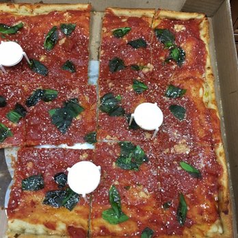 America's Pie Tinicum - Tomato Pie. Delivery driver was late so this is a bit cold, comes with a spicy garlic bite. Not bad next time I hope it comes hot - Pizza Near Me - Tinicum, Pennsylvania