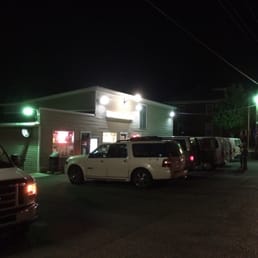 cars parked outside at night cars parked outside at night
