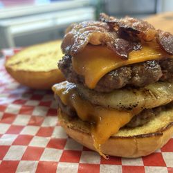 Grills Gone Wild - Tropic Thunder Burger. Two house made patties with grilled pineapple and bacon...never go full pineapple...