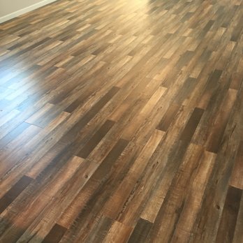 Thomsen Homes - One of a kind laminate wood flooring! - Home Developers Near Me - Fargo, North Dakota