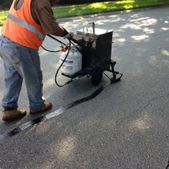 Prime paving - Hot rubber crackfilling - Masonry/Concrete Near Me