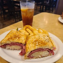 Reuben sandwich and fries with sweet tea