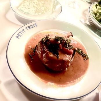 Petit Trois - a plate of food on a table - French Near Me - Sherman Oaks, California Petit Trois - a plate of food on a table - French Near Me - Sherman Oaks, California