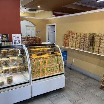 Khasiyat Indian Restaurant - Cold case for prepackaged sweets, and shelves for the savory. - Indian Near Me - Orlando, Florida Khasiyat Indian Restaurant - Cold case for prepackaged sweets, and shelves for the savory. - Indian Near Me - Orlando, Florida
