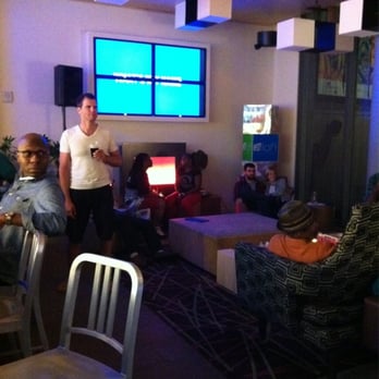 W XYZ Bar - a group of people sitting and standing in a room - Venues & Event Spaces Near Me - New York, New York