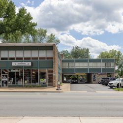 Tint-A Modern Makerspace - Exterior. Picture of the building where Tint is located (at the back). Please turn into the driveway and continue to the back of the lot.