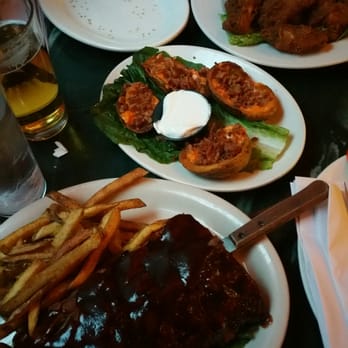 Skinflints - 1/2 ribs, potato skins and wings.. we had 2 beers and the bill came out to $43 pricing is very reasonable and the food is amazing. - American Near Me - Brooklyn, New York