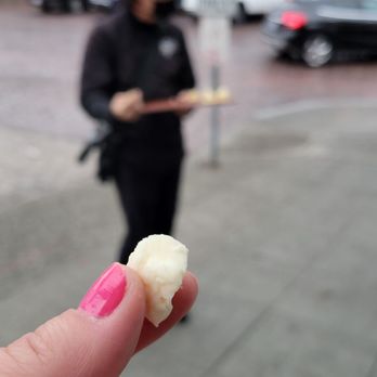 Eat Seattle Tours - Just one of the many samples--with Chef John in the background - Food Tours Near Me - Seattle, Washington