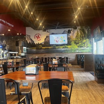 Mountain Mike's Pizza - Dining room, TV's and Yosemite pictures on the walls - Pizza Near Me - Clovis, California