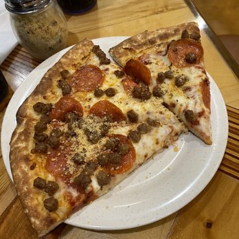 Mr Gatti's Pizza - two slices of pizza on a plate - Pizza Near Me - Shepherdsville, Kentucky Mr Gatti's Pizza - two slices of pizza on a plate - Pizza Near Me - Shepherdsville, Kentucky