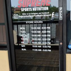 Primal Graphics - New hours means new door vinyl