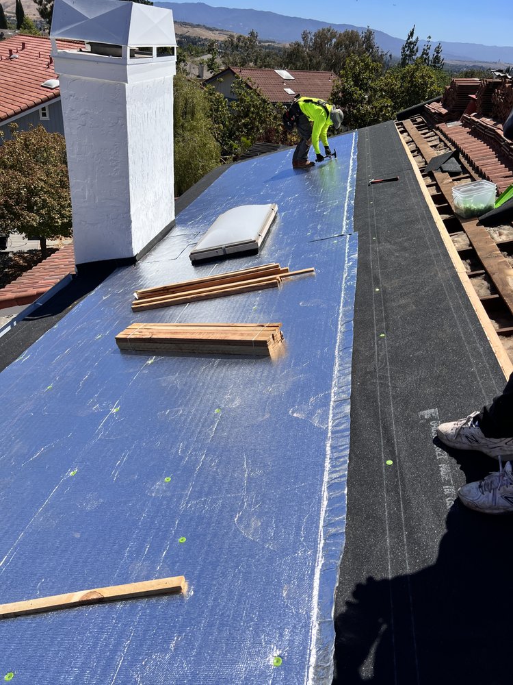 Slide of Zenith Roofers