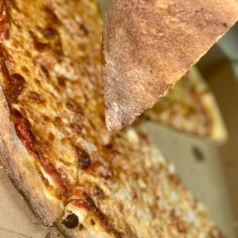 Tony G’s - a slice of pizza being taken out of a box - Pizza Near Me - Medford, New Jersey Tony G’s - a slice of pizza being taken out of a box - Pizza Near Me - Medford, New Jersey