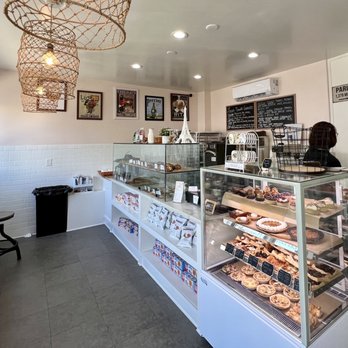 Little French Bakery - Inside view with a few small tables behind me and two more on the sidewalk. - Bakeries Near Me - Manhattan Beach, California Little French Bakery - Inside view with a few small tables behind me and two more on the sidewalk. - Bakeries Near Me - Manhattan Beach, California