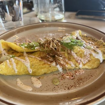 Uncle Wolfie's Breakfast Tavern - Potato omelet - Breakfast & Brunch Near Me - Milwaukee, Wisconsin Uncle Wolfie's Breakfast Tavern - Potato omelet - Breakfast & Brunch Near Me - Milwaukee, Wisconsin