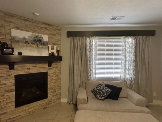 Custom built valances and cabinet hardware - Added an additional touch of luxury by custom building valances to match fireplace mantel and cabinets then adding hardware to their cabinets and shelving in the laundry room to create more space.