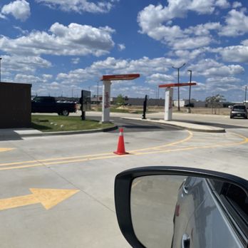 Bojangles - a view of a gas station from a car window - Chicken Shop Near Me - Monroe, Louisiana