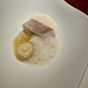 Addison - steamed amadai, onions, salted cashews, coconut crab emulsion - New American Near Me - San Diego, California Addison - steamed amadai, onions, salted cashews, coconut crab emulsion - New American Near Me - San Diego, California