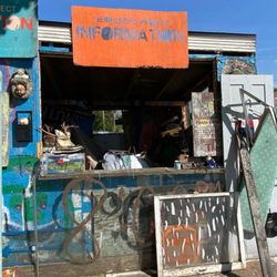 Heidelberg Project - There's an information booth with a pamphlet and a donation box
