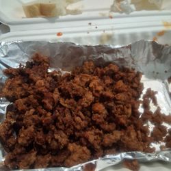 Charlottes Kitchenette - What you are seeing is a tray full of burned crust and crumb pieces from my chicken liver order which only had 7 small livers. Disappointing