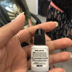 Lumi Garnet Wellness Nail Bar - Glue used to do eyelashes.