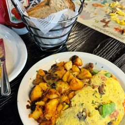 California omelette , breakfast potatoes, and toast.