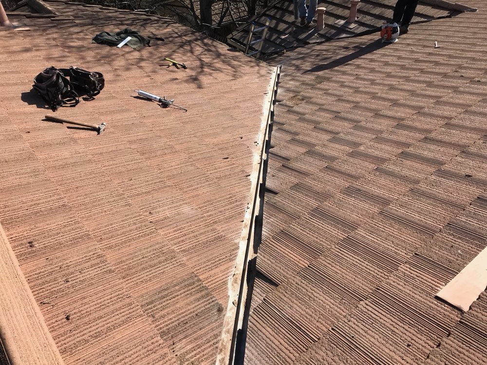 Slide of Academy Roofing