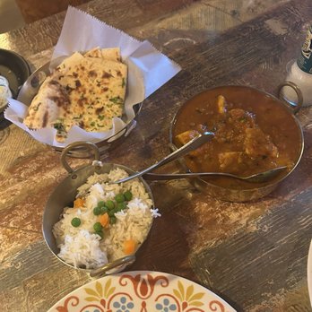 Taste of India - garlic naan, chicken curry, rice - Indian Near Me - Melbourne, Florida