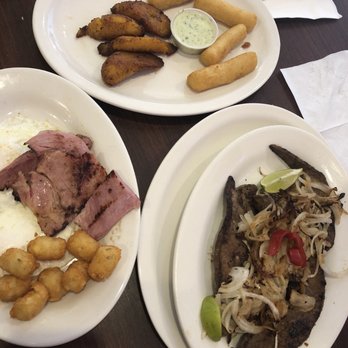 El Rinconcito Latino Doral - 20180923 - left 2 egg breakfast with ham tarot tots. Right and top is liver steak with plantains and yuca. - Latin American Near Me - Miami, Florida El Rinconcito Latino Doral - 20180923 - left 2 egg breakfast with ham tarot tots. Right and top is liver steak with plantains and yuca. - Latin American Near Me - Miami, Florida
