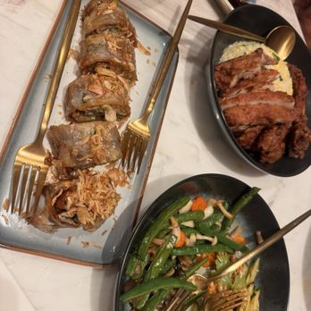 Supreme Dumplings - That dish on the left is actually surprisingly good. It's some truffle roll. - Shanghainese Near Me - Honolulu, Hawaii Supreme Dumplings - That dish on the left is actually surprisingly good. It's some truffle roll. - Shanghainese Near Me - Honolulu, Hawaii