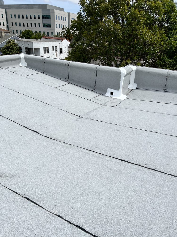 Slide of Manny's Roofing Inc